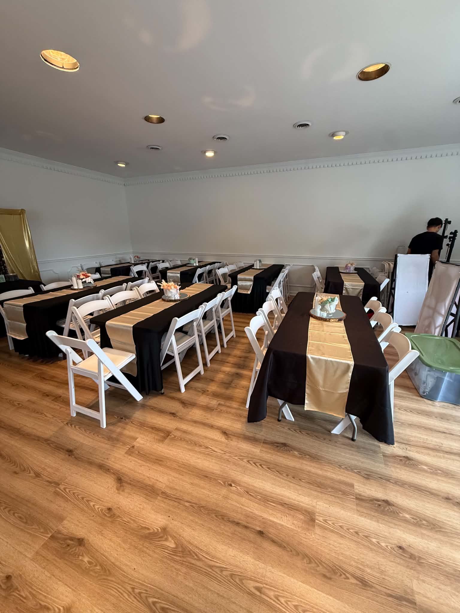 JVL Venue sample evening celebration setup with black linens and custom accents