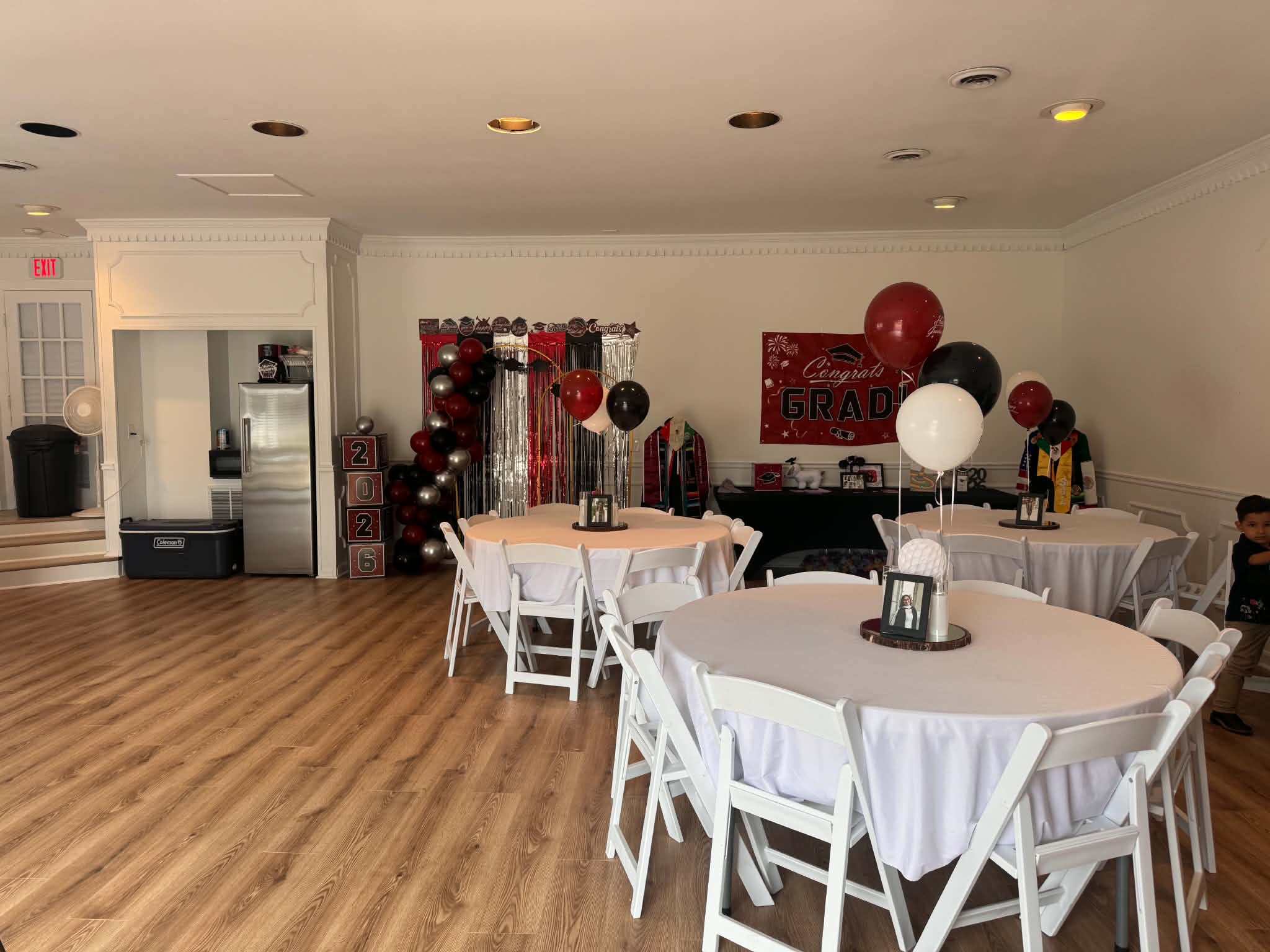 JVL Venue banqueting hall layout with round tables, chairs, and white linens